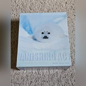 Vanishing Act - Harp Seal Pup - 550 Pc Camouflage Jigsaw Puzzle by Art Wolfe